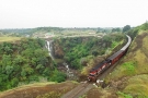 Train to Patalpani 044 - Train 52963 passing the Patalpani waterfalls