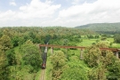 Train to Patalpani 136 - Akola bound train 52973 passes under the Dhulghat spiral viaduct
